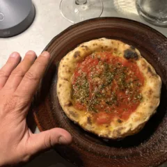 La dimensione di una pizza con panetto da 70 grammi