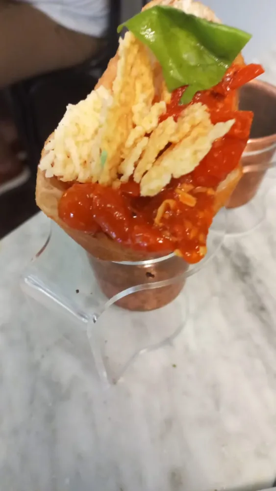 Rocco Cono fritto fonduta di Grana Padano piennolo salsiccia di suino di razza casertana, peperoncino - Pepe in Grani