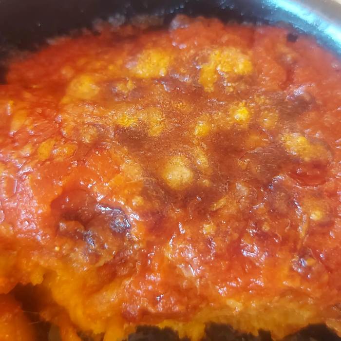 Bluuguerritore, parmigiana di melanzane