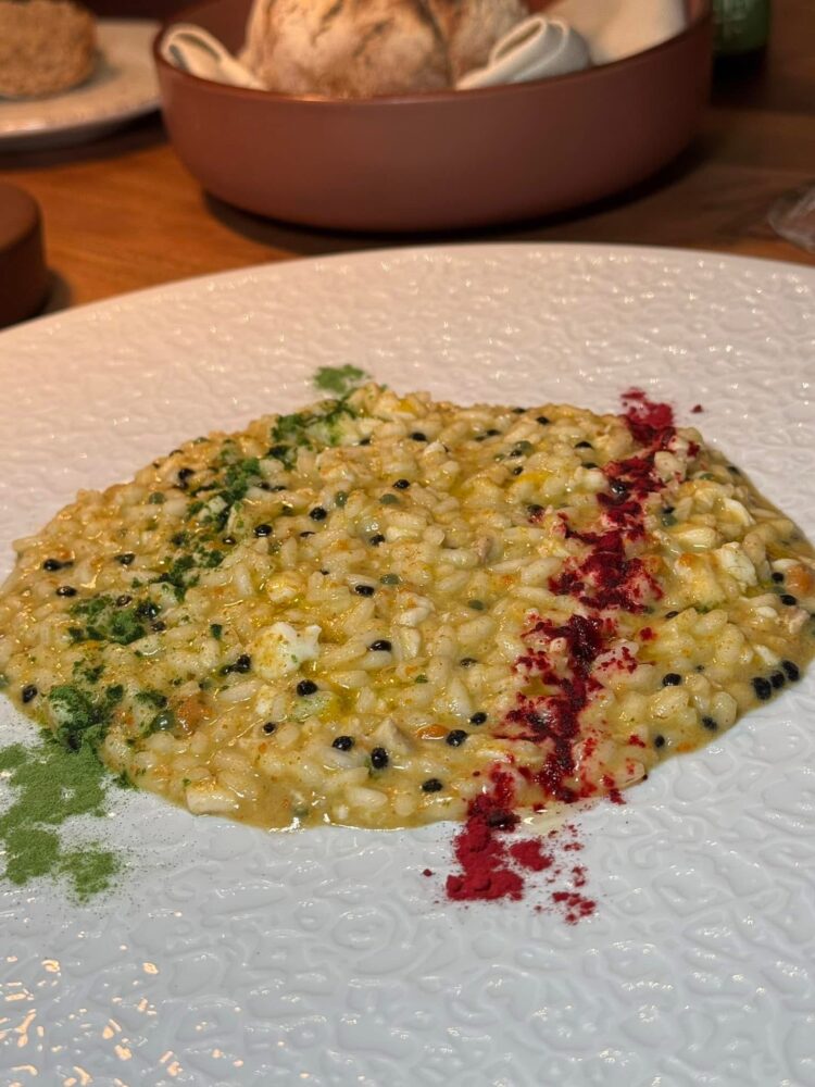 Il Presidente - risotto ricci e orata con perlage di basilico e tartufo nero